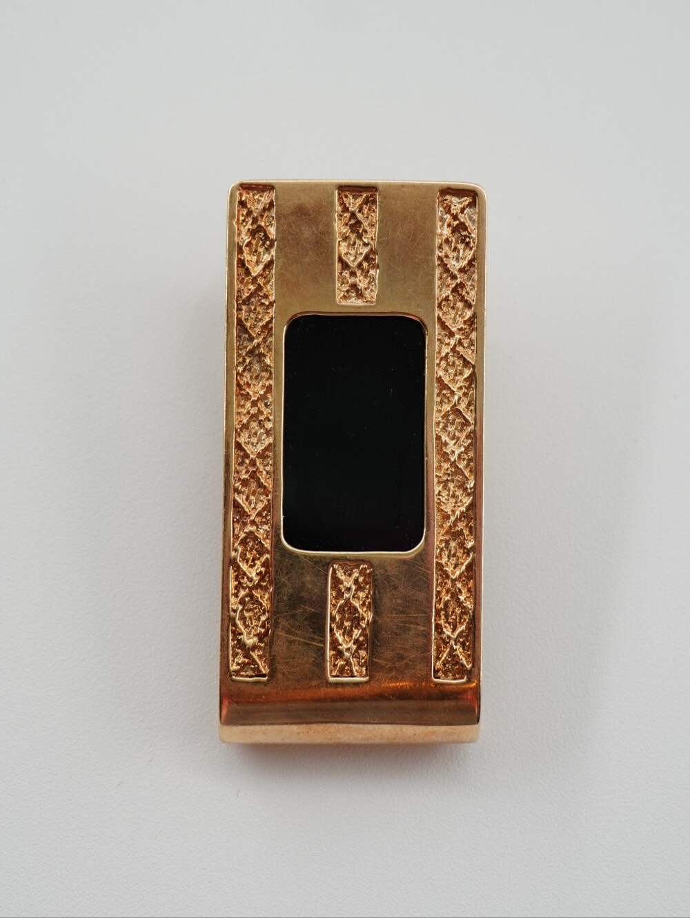 The Vintage Hofra 14k Money Clip is a luxurious accessory for men, weighing 21.3